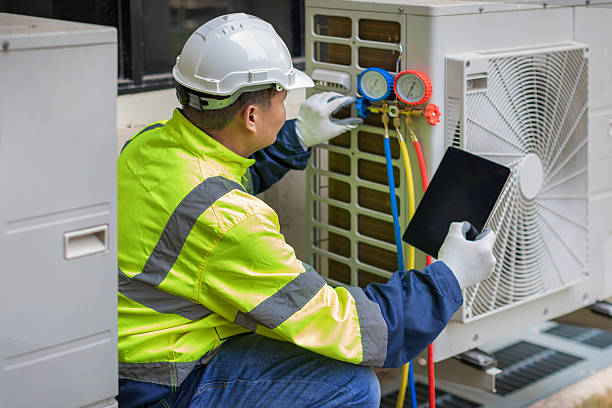Professional Air Conditioning Repair technician working in Grove City, PA